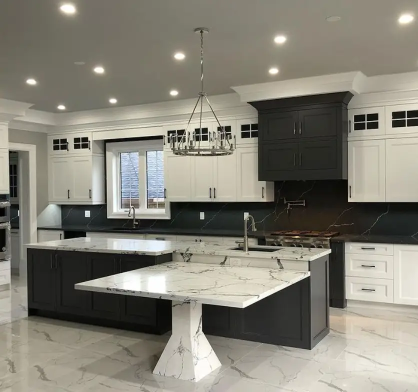 Kitchen island connected to a pedestal dining table