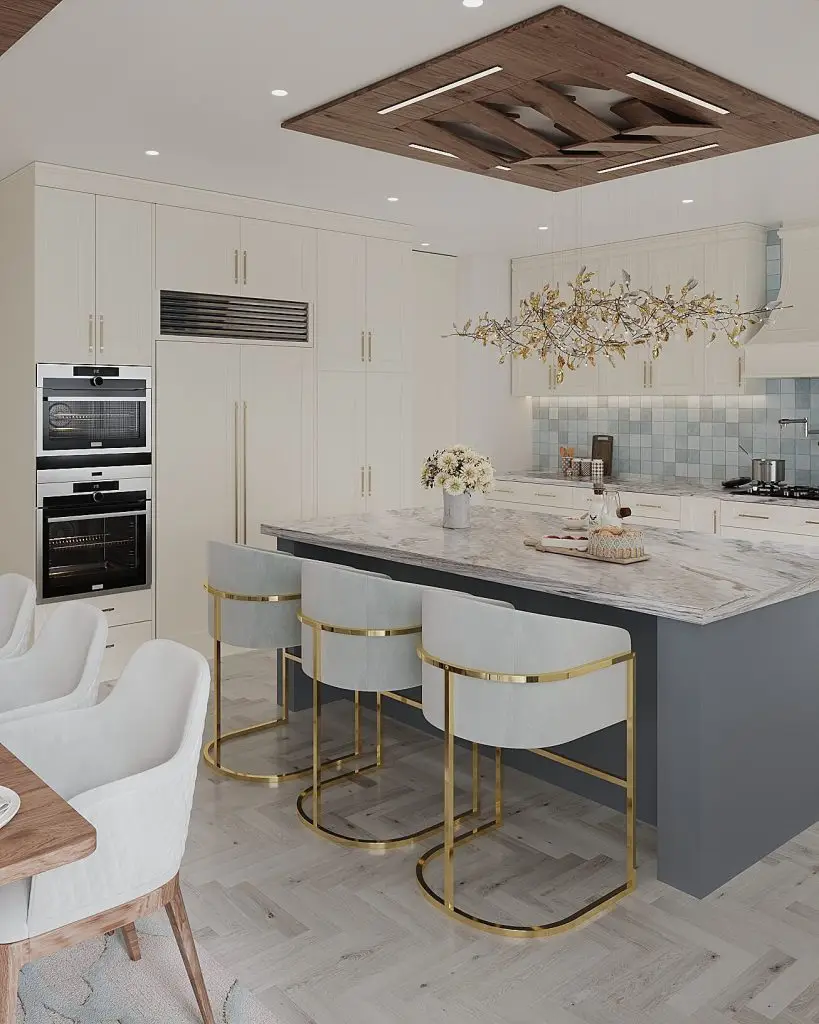 Main kitchen with a large island in an Oakville custom home by Euphoric Design Studio, interior designer in Oakville